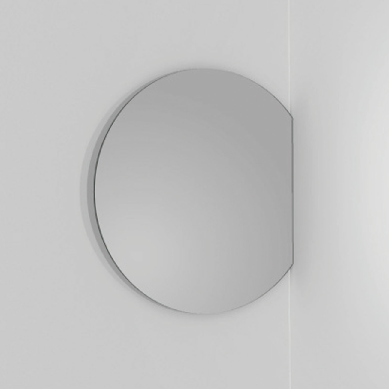 Plain round truncated side frameless mirror by Maderó Atelier
