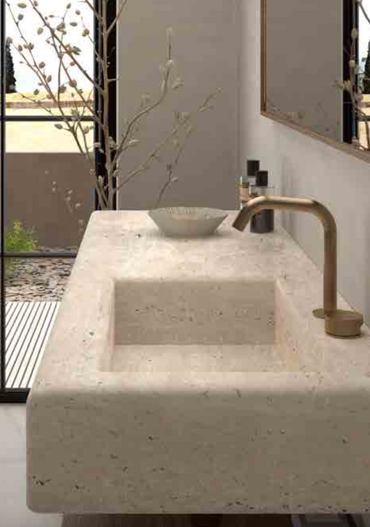 Encimera de mármol con faldón y lavabo integrado Itaca de Maderó Atelier